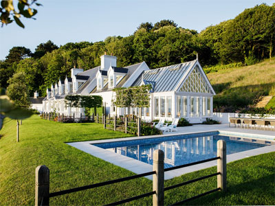 Jersey Garden Design. Bespoke fences. Swimming Pool construction. Vale Conservatory. Pleached trees.